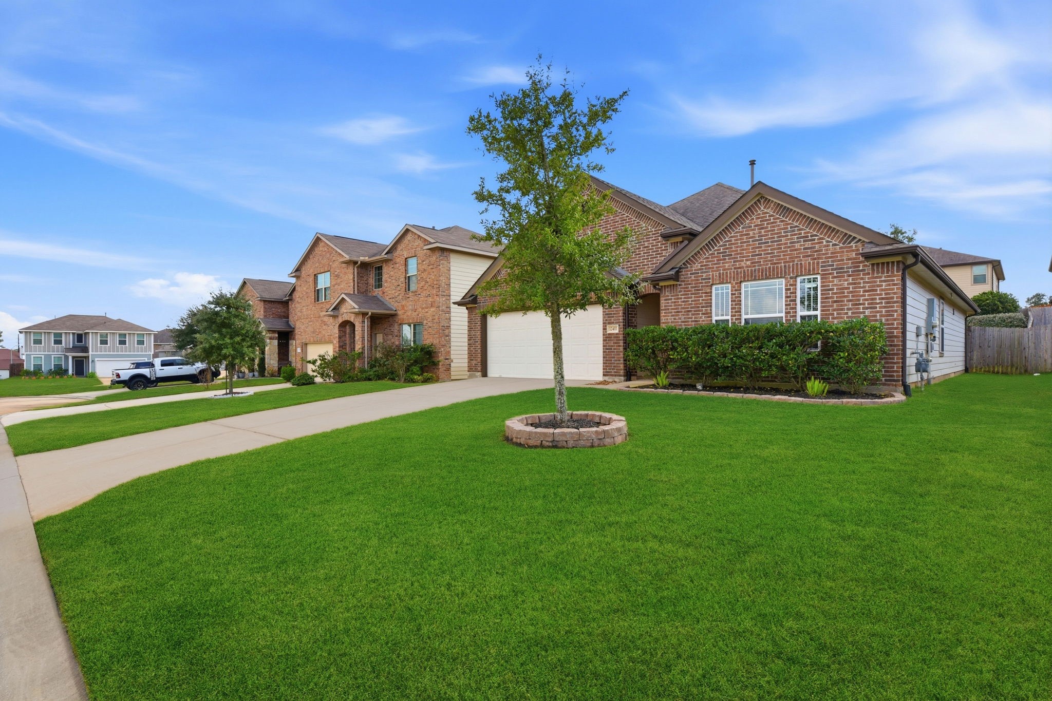 12411 Southern Trail Court Magnolia, TX 77354 - Photo 7 of 38 a front view of house with yard and green space