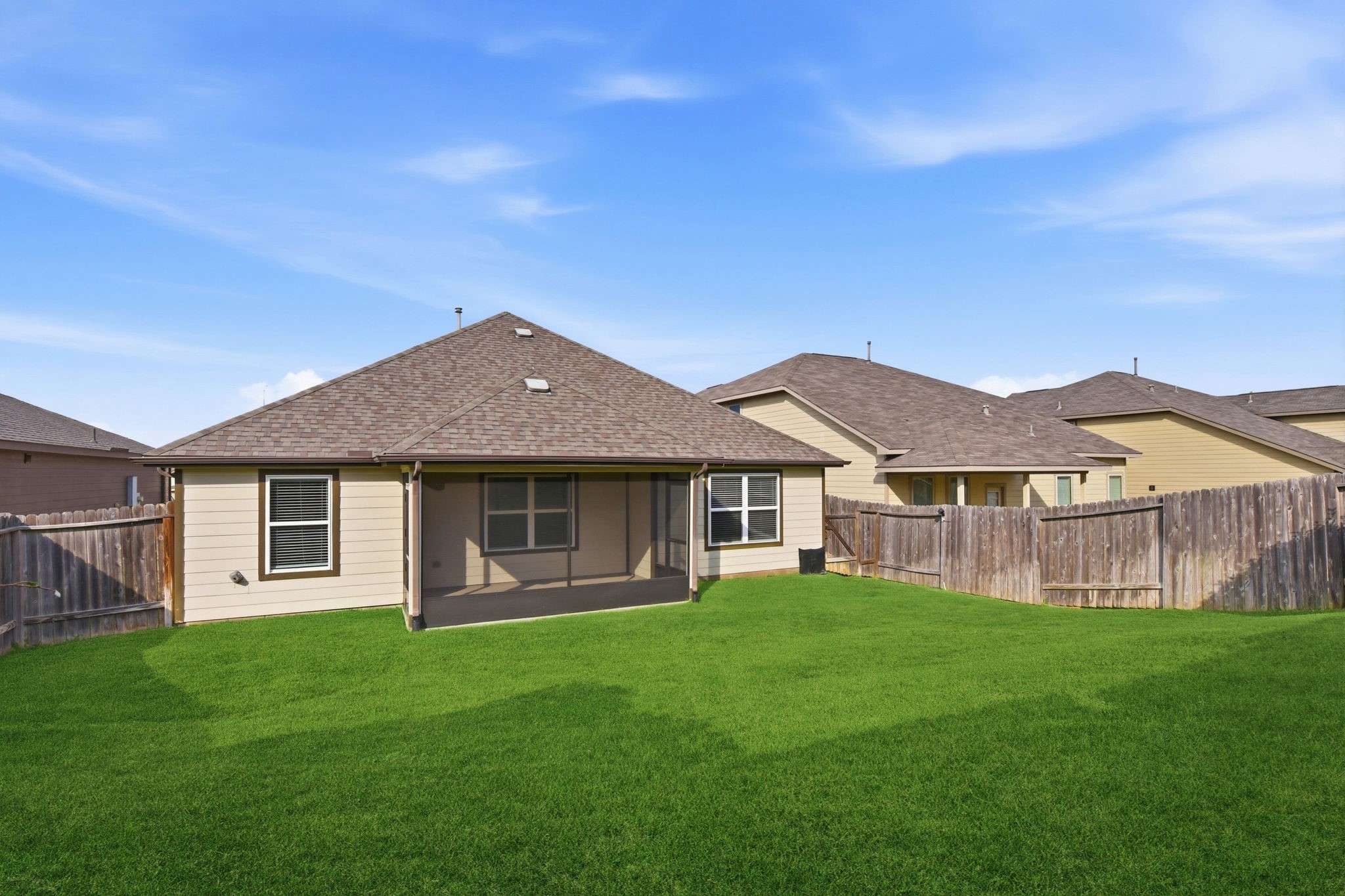 12411 Southern Trail Court Magnolia, TX 77354 - Photo 10 of 38 a view of a house with a yard and large tree