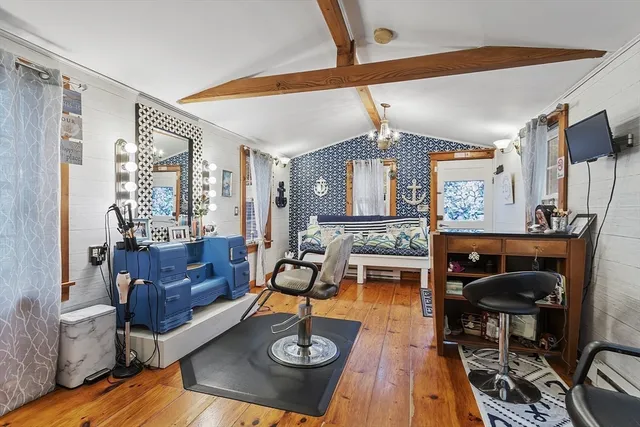 a view of balcony with furniture