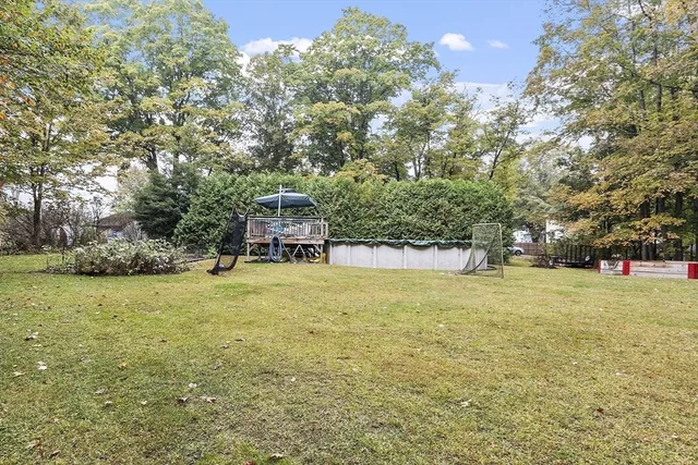 a view of a chairs and table in the patio