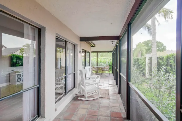 a bathroom with a large tub and shower