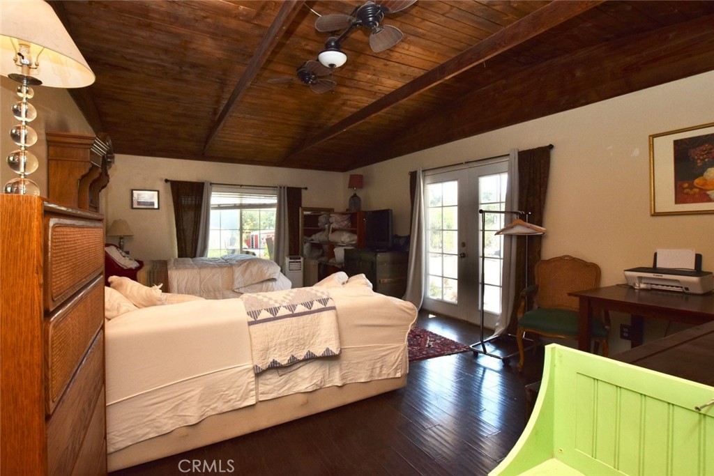 76980 San Antonio Road Bradley, CA 93426 - Photo 12 of 54 a bedroom with bed and wooden floors