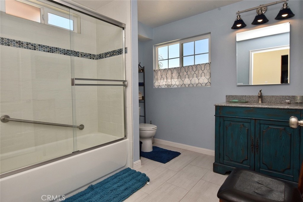 76980 San Antonio Road Bradley, CA 93426 - Photo 14 of 54 a bathroom with a sink a toilet and shower