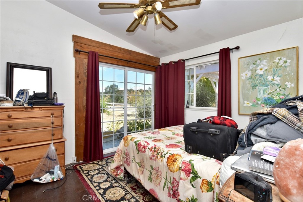 76980 San Antonio Road Bradley, CA 93426 - Photo 17 of 54 a bedroom with a bed and a large window