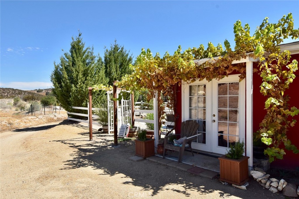 76980 San Antonio Road Bradley, CA 93426 - Photo 20 of 54 a front view of a house with a tree