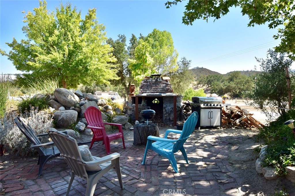 76980 San Antonio Road Bradley, CA 93426 - Photo 43 of 54 a view of a chairs and table in backyard