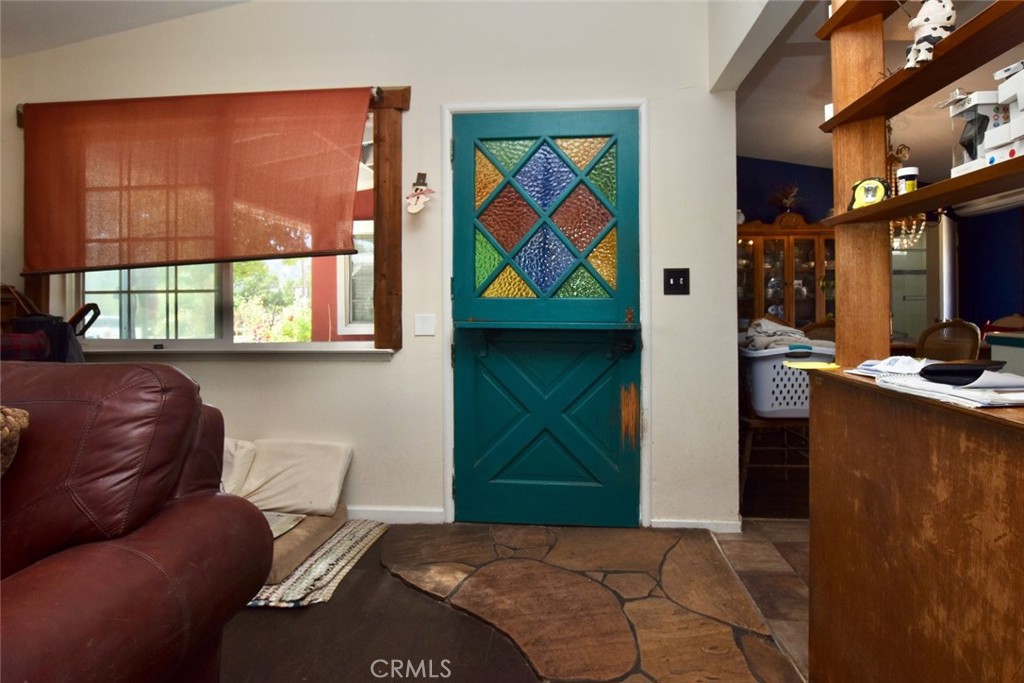 76980 San Antonio Road Bradley, CA 93426 - Photo 6 of 54 a bedroom with a bed and a painting on the wall