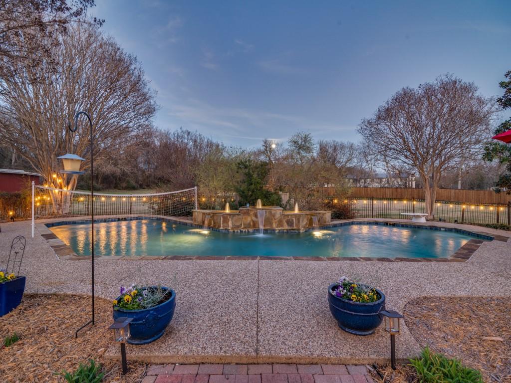 343 East Tripp Road Sunnyvale, TX 75182 - Photo 2 of 36 a view of a fountain in the backyard