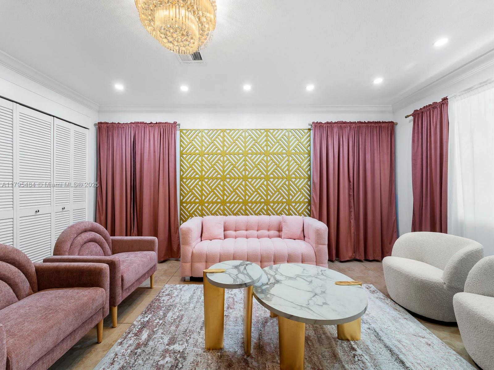1761 Northeast 52nd Street, Unit 12 Fort Lauderdale, FL 33334 - Photo 11 of 19 a living room with furniture and a large window