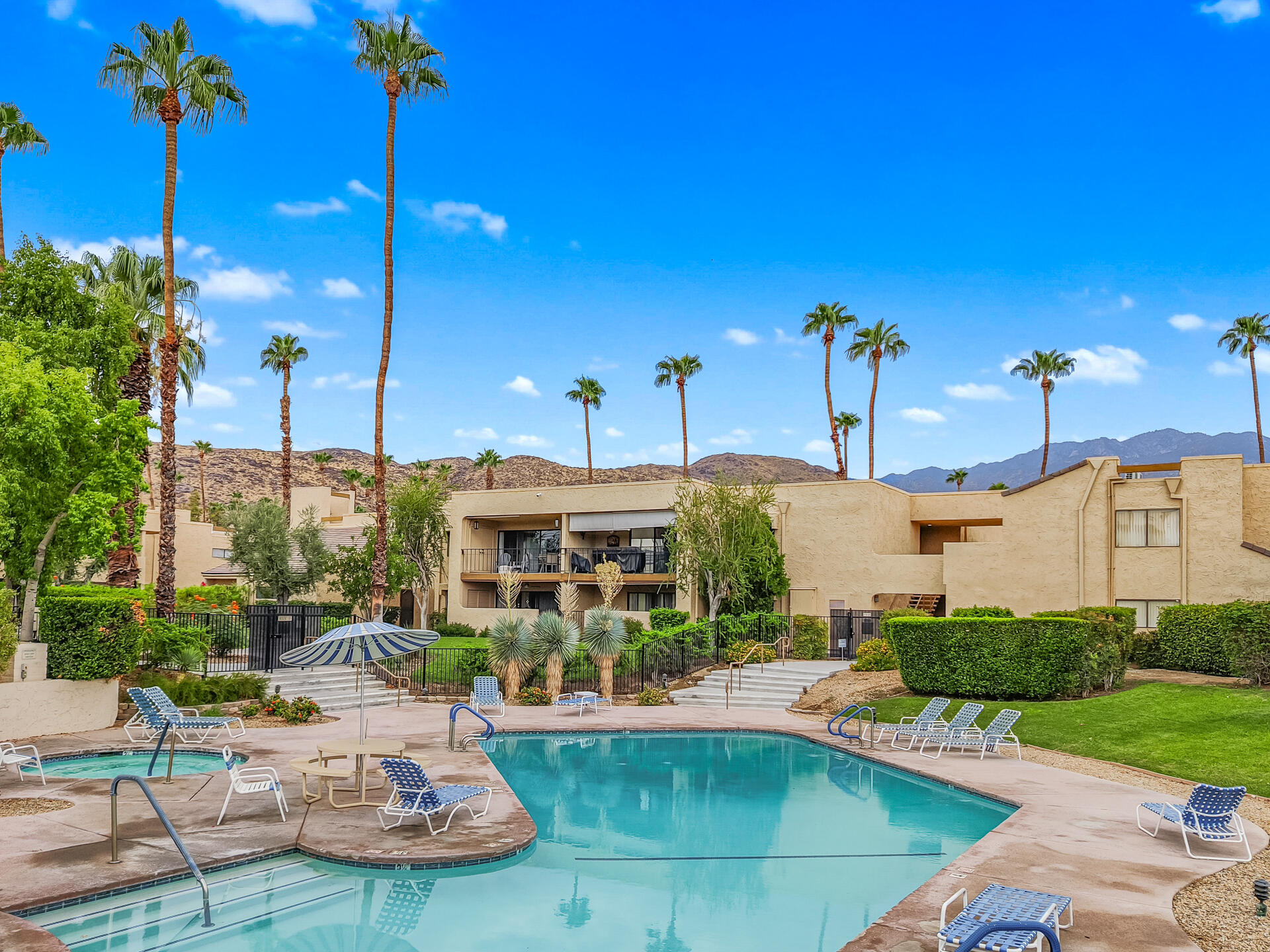 a house view with a sitting space and a view of a park