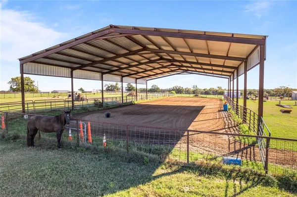 a view of a swimming pool with a patio