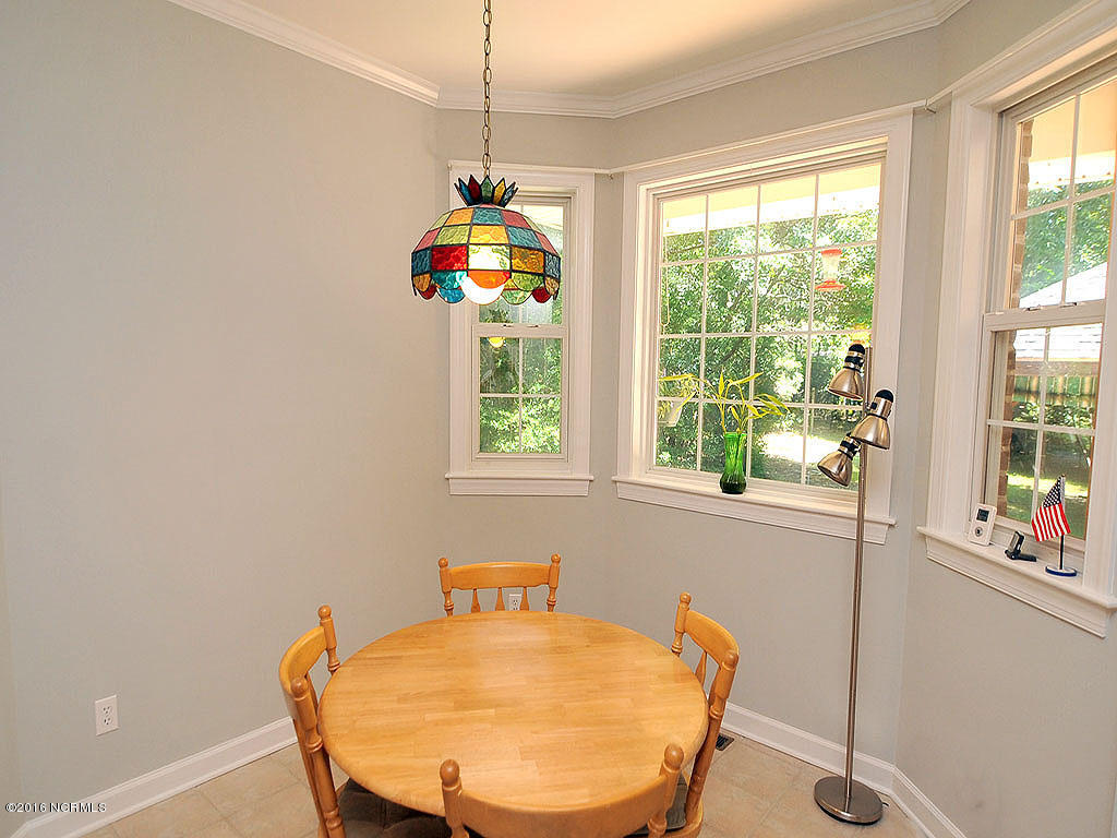 602 Hughes Road Hampstead, NC 28443 - Photo 15 of 31 Bay window area overlooks beautiful backyard and an abundance of trees