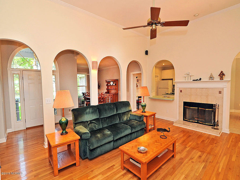 602 Hughes Road Hampstead, NC 28443 - Photo 8 of 31 Gorgeous wood floors, and recent paint, make this home move-in ready!