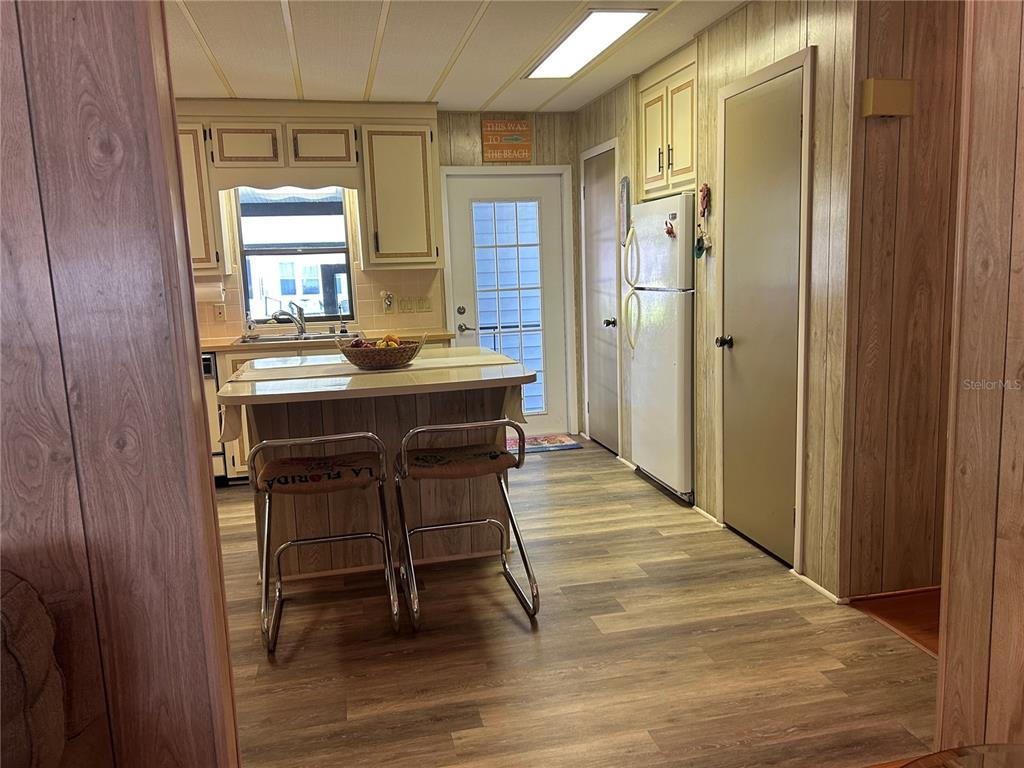 12501 Ulmerton Road, Unit 216 Largo, FL 33774 - Photo 16 of 34 a view of a kitchen from the hallway