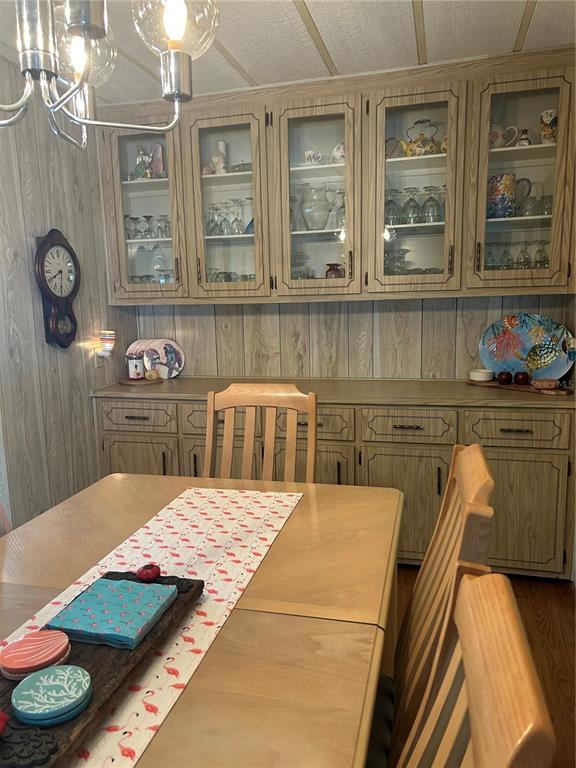 12501 Ulmerton Road, Unit 216 Largo, FL 33774 - Photo 17 of 34 a bedroom with a bed and dresser