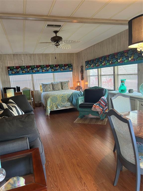 12501 Ulmerton Road, Unit 216 Largo, FL 33774 - Photo 19 of 34 a living room with furniture and wooden floor