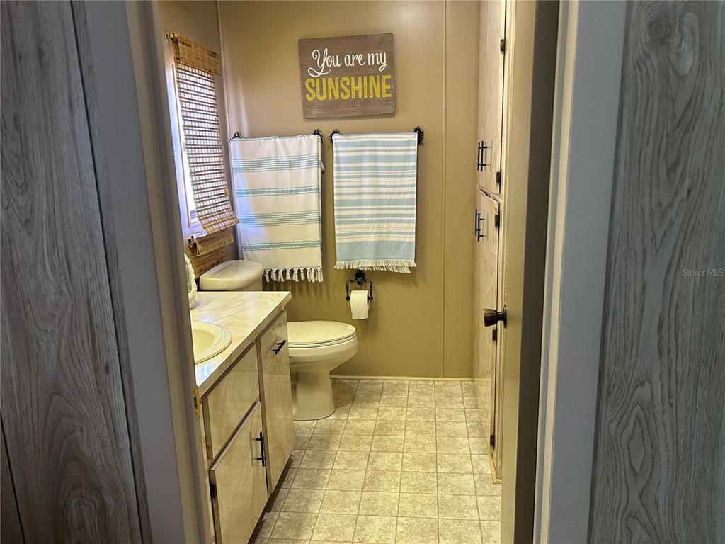 12501 Ulmerton Road, Unit 216 Largo, FL 33774 - Photo 27 of 34 a bathroom with a toilet