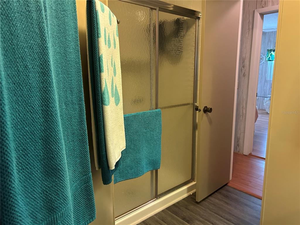 12501 Ulmerton Road, Unit 216 Largo, FL 33774 - Photo 31 of 34 a view of a bathroom from a hallway