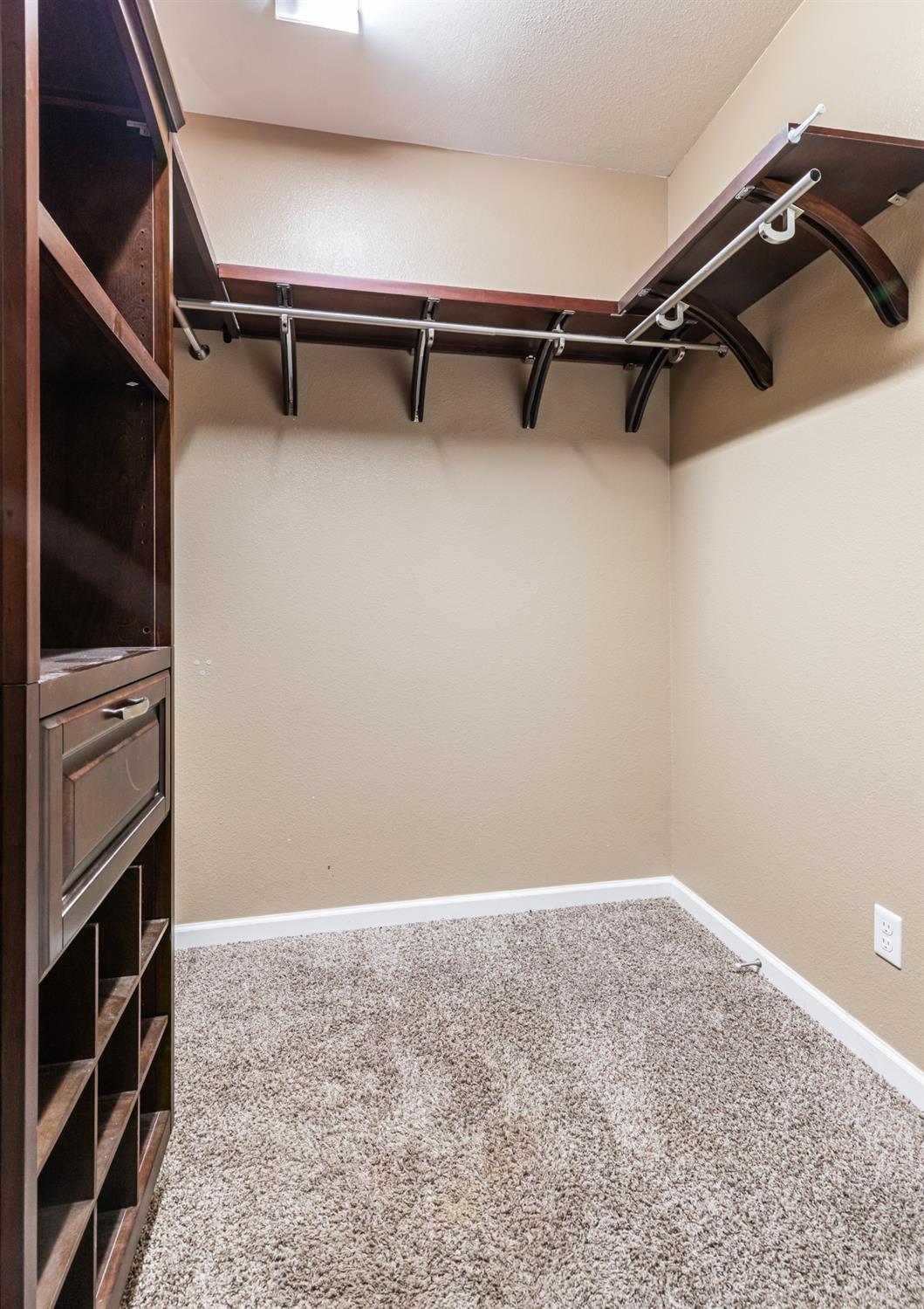 863 Legacy Drive Lemoore, CA 93245 - Photo 27 of 33 a view of a room with racks on the wall