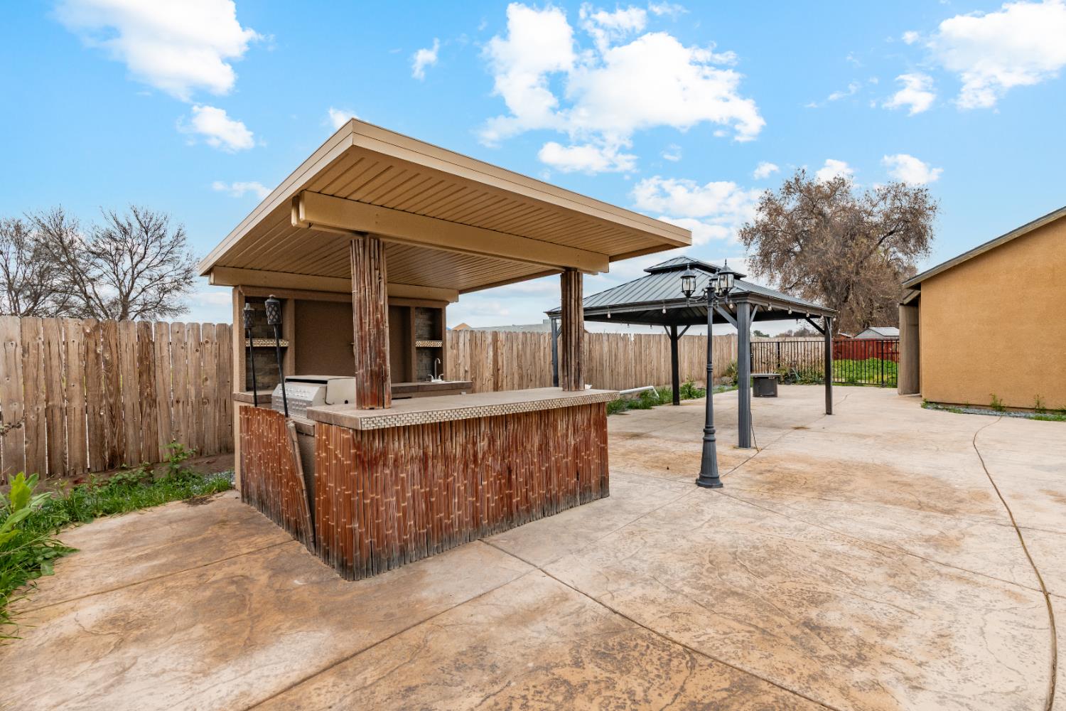 863 Legacy Drive Lemoore, CA 93245 - Photo 31 of 33 a view of a house with a patio