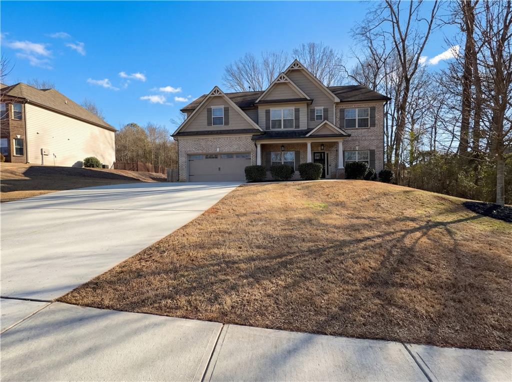 2110 George Bush Lane Jefferson, GA 30549 - Photo 1 of 40 a front view of a house with a yard