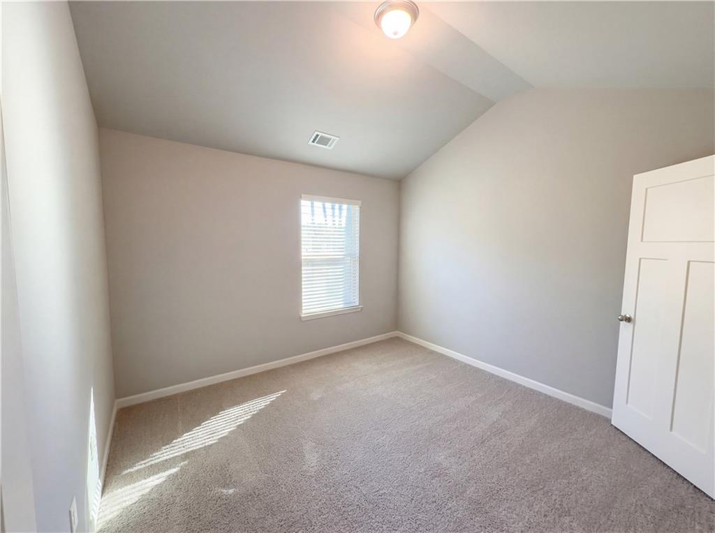 2110 George Bush Lane Jefferson, GA 30549 - Photo 30 of 40 an empty room with windows