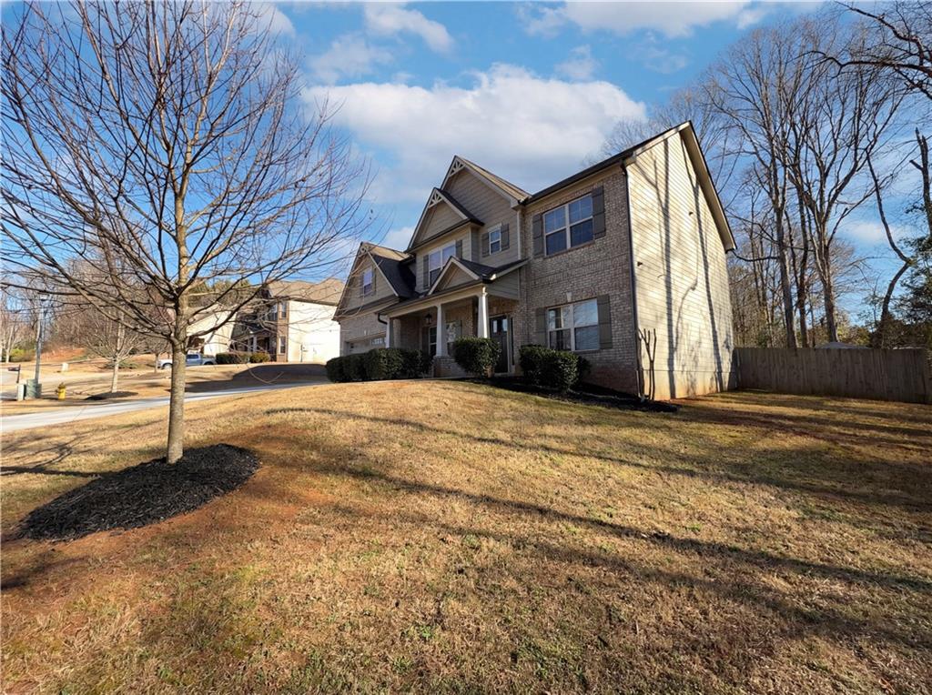 2110 George Bush Lane Jefferson, GA 30549 - Photo 3 of 40 a view of a yard with brick house