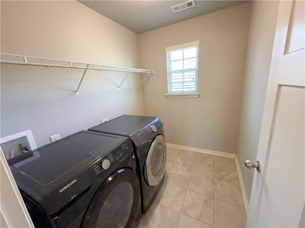 2110 George Bush Lane Jefferson, GA 30549 - Photo 35 of 40 a utility room with dryer and washer