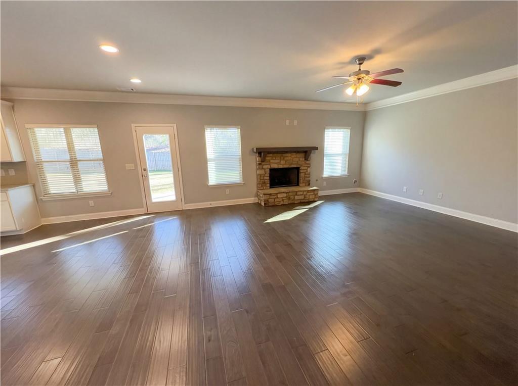 2110 George Bush Lane Jefferson, GA 30549 - Photo 6 of 40 a view of an empty room with wooden floor and a window