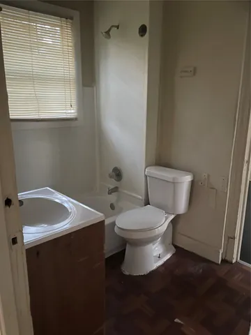 a kitchen with granite countertop a stove and a sink