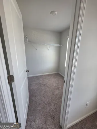 en empty room with windows