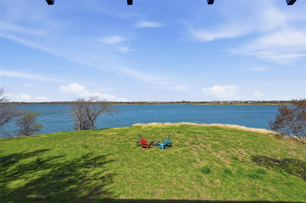 13280 Beach Club Road The Colony, TX 75056 - Photo 24 of 40 a view of lake with beach