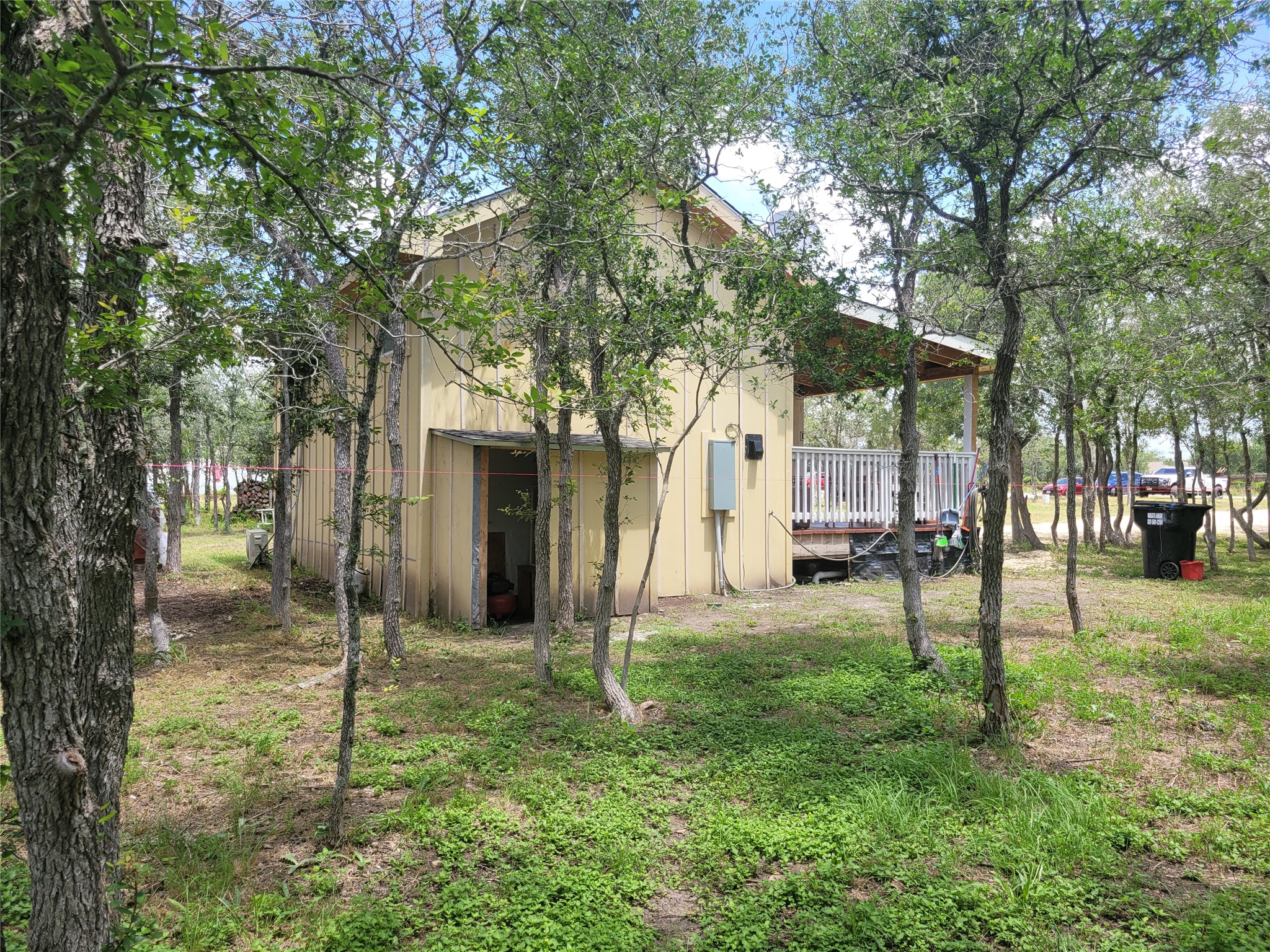 233 St Mary's Road Dale, TX 78616 - Photo 2 of 25 a backyard of a house with lots of green space