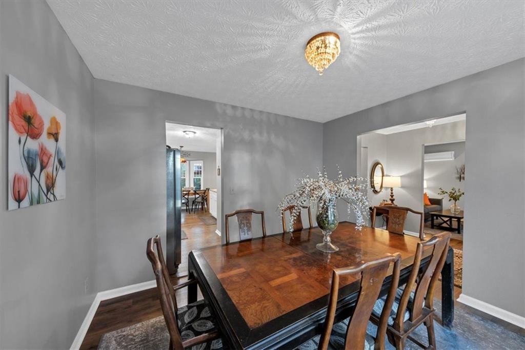 2710 Braemore Place Powder Springs, GA 30127 - Photo 12 of 53 a view of a dining room with furniture