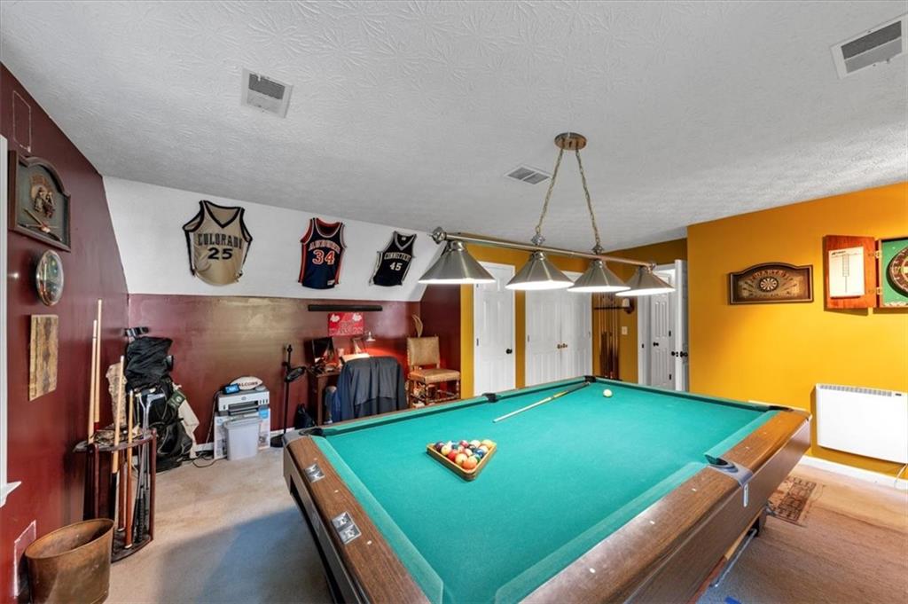 2710 Braemore Place Powder Springs, GA 30127 - Photo 41 of 53 a room with musical instruments