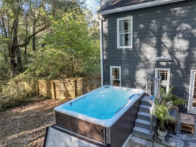 a front view of house with an outdoor seating