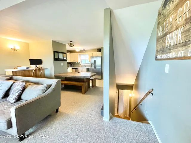 a bed room with furniture and a window