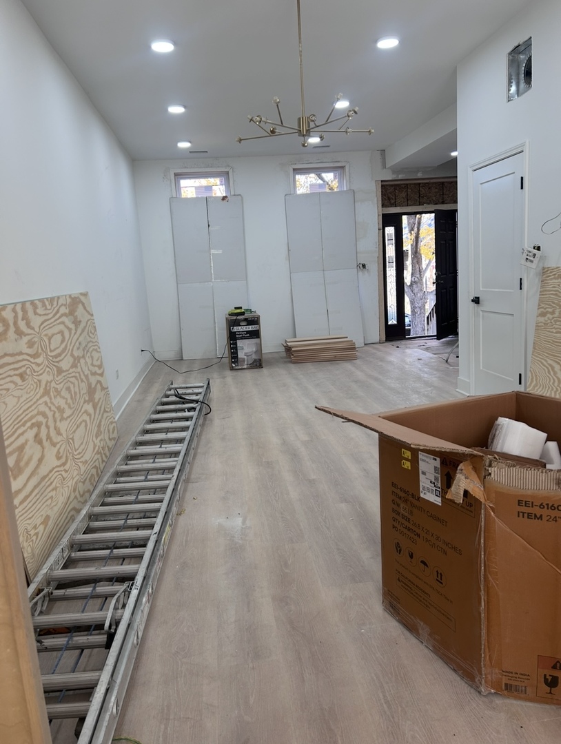 3445 West Walnut Street Chicago, IL 60624 - Photo 2 of 5 a view of kitchen and kitchen island