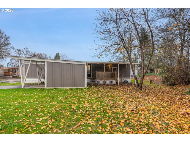 a view of balcony with wooden floor