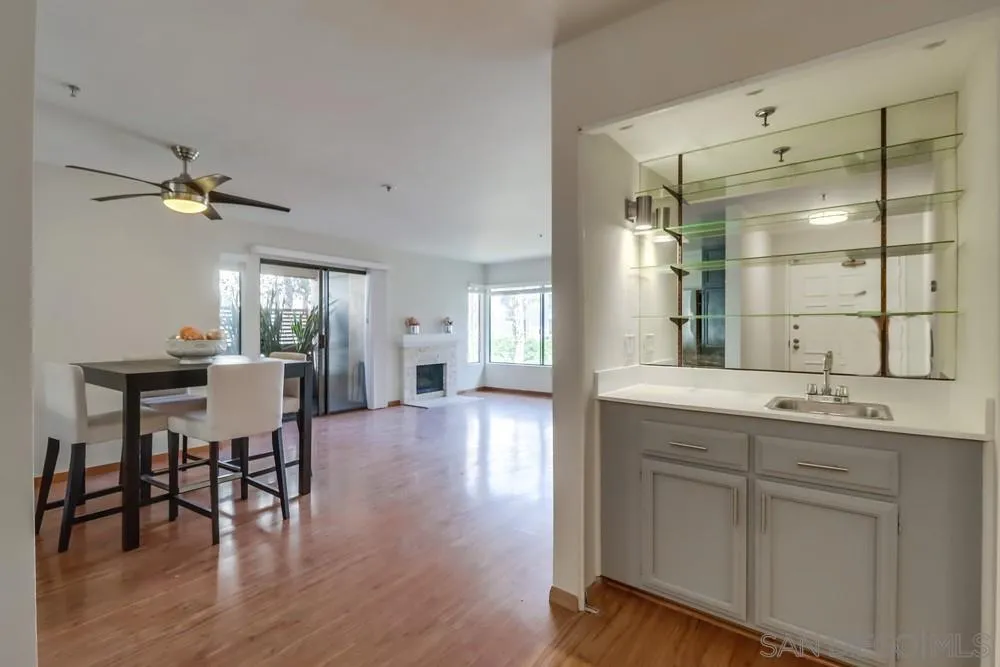 a view of a kitchen and dining room