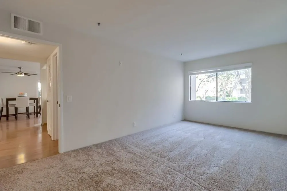 5665 Friars Road, Unit 219 San Diego, CA 92110 - Photo 16 of 34 an empty room with windows