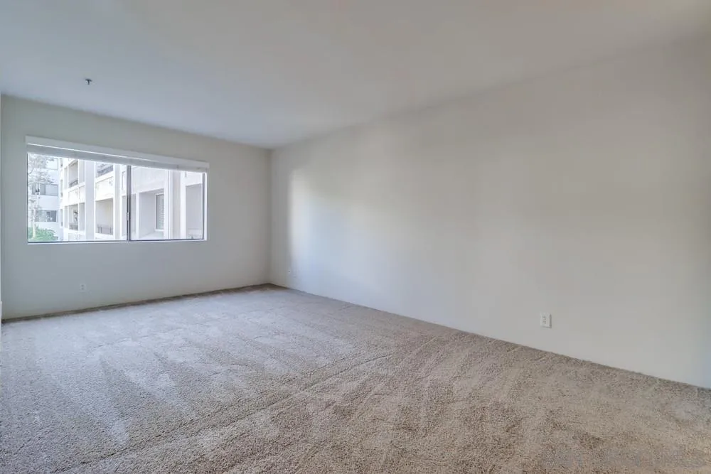 5665 Friars Road, Unit 219 San Diego, CA 92110 - Photo 17 of 34 an empty room with windows