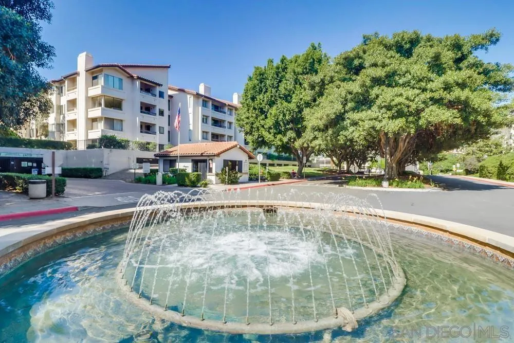 5665 Friars Road, Unit 219 San Diego, CA 92110 - Photo 33 of 34 a view of a swimming pool with a patio