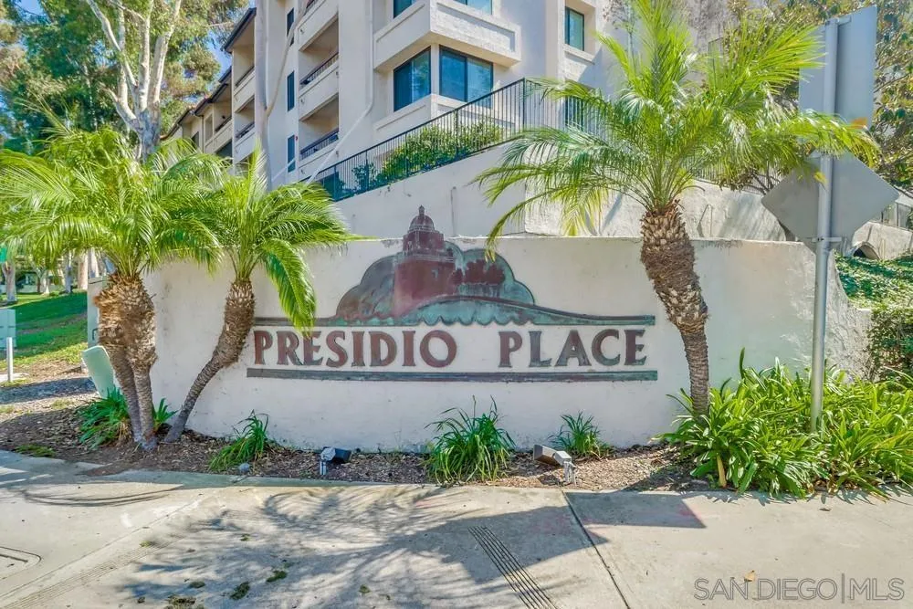 5665 Friars Road, Unit 219 San Diego, CA 92110 - Photo 34 of 34 a street sign that is sitting on a brick wall