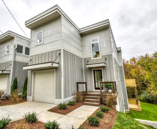 Come home to this new construction East Nashville contemporary home designed by award winning architect Manuel Zeitlin. The home features an attached garage and three levels of living space. 
