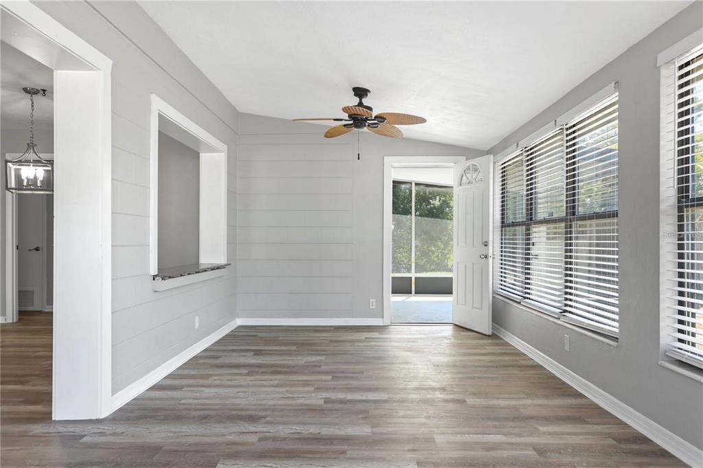 6615 Renssalaer Drive Bradenton, FL 34207 - Photo 23 of 31 a view of an empty room with a window and wooden floor