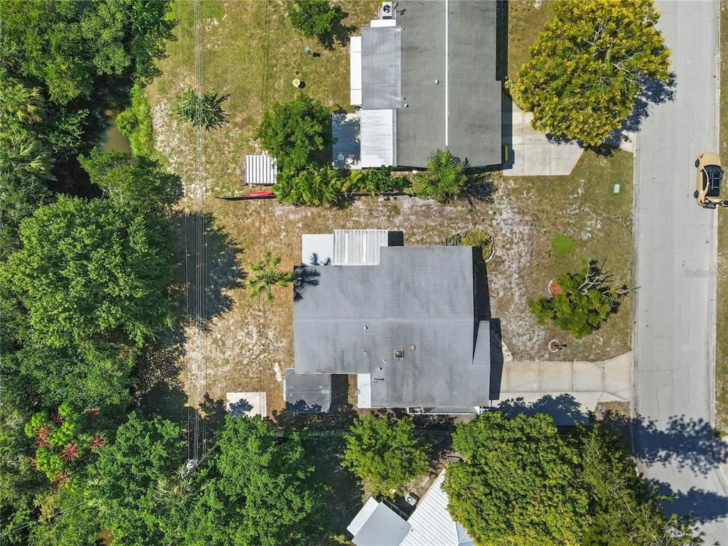 6615 Renssalaer Drive Bradenton, FL 34207 - Photo 26 of 31 an aerial view of a house with a yard and garden