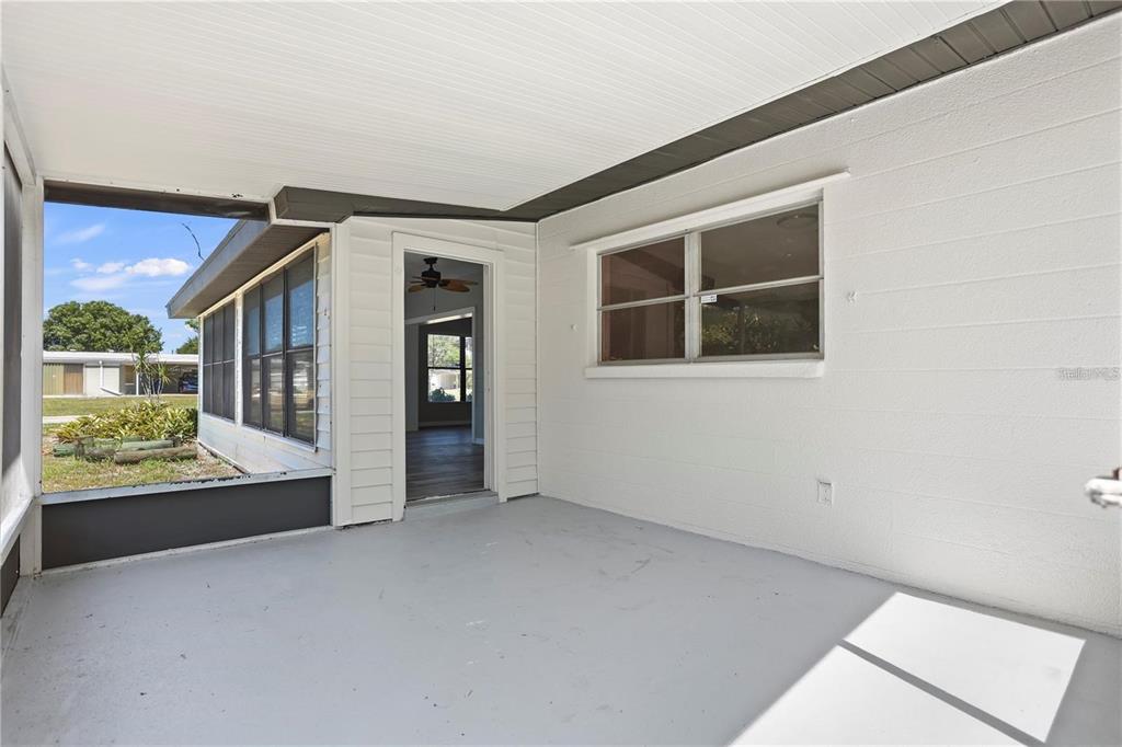 6615 Renssalaer Drive Bradenton, FL 34207 - Photo 6 of 31 an empty room with windows