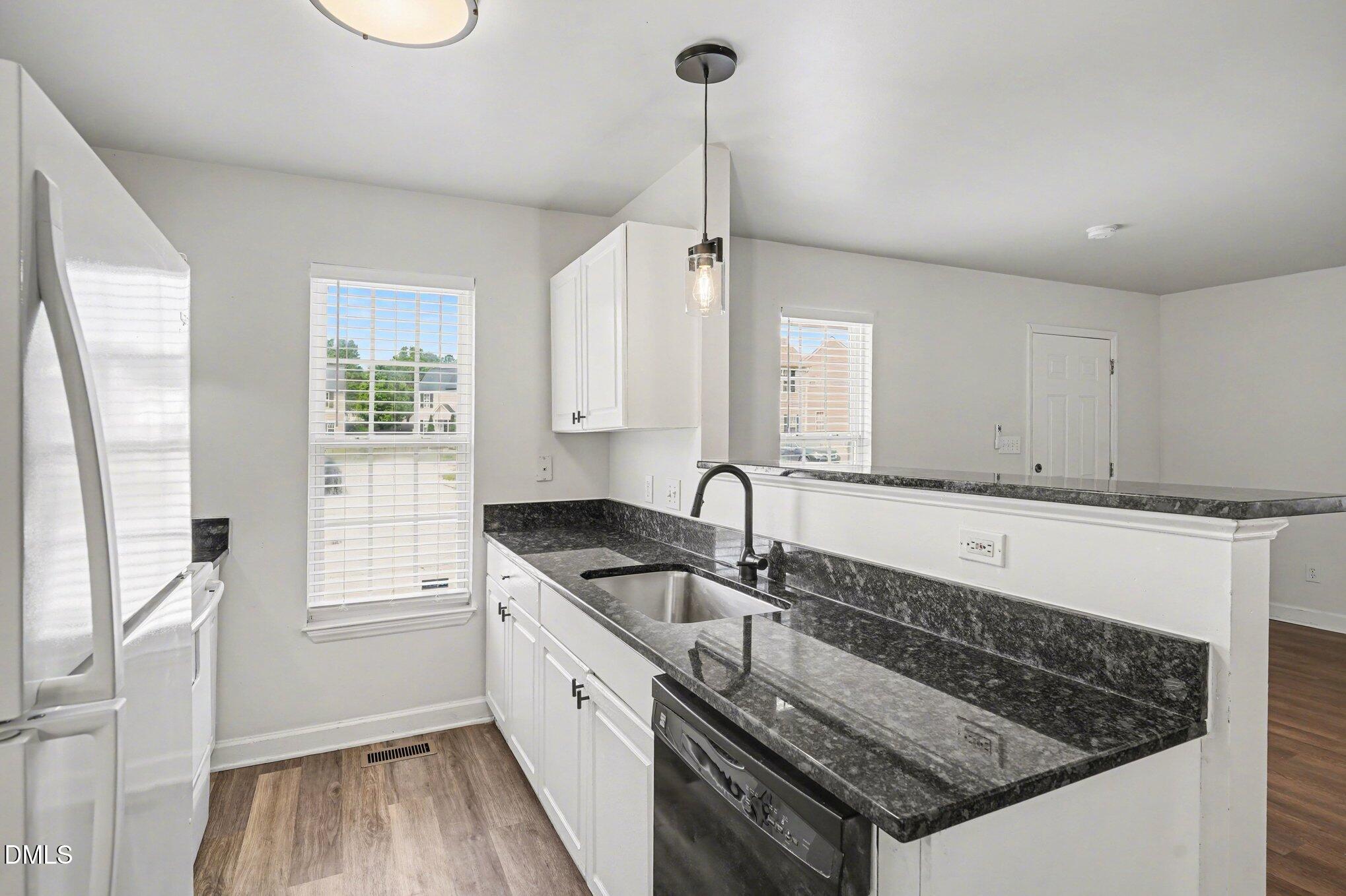 1237 Swingline Way Raleigh, NC 27610 - Photo 2 of 14 Bright Clean Kitchen