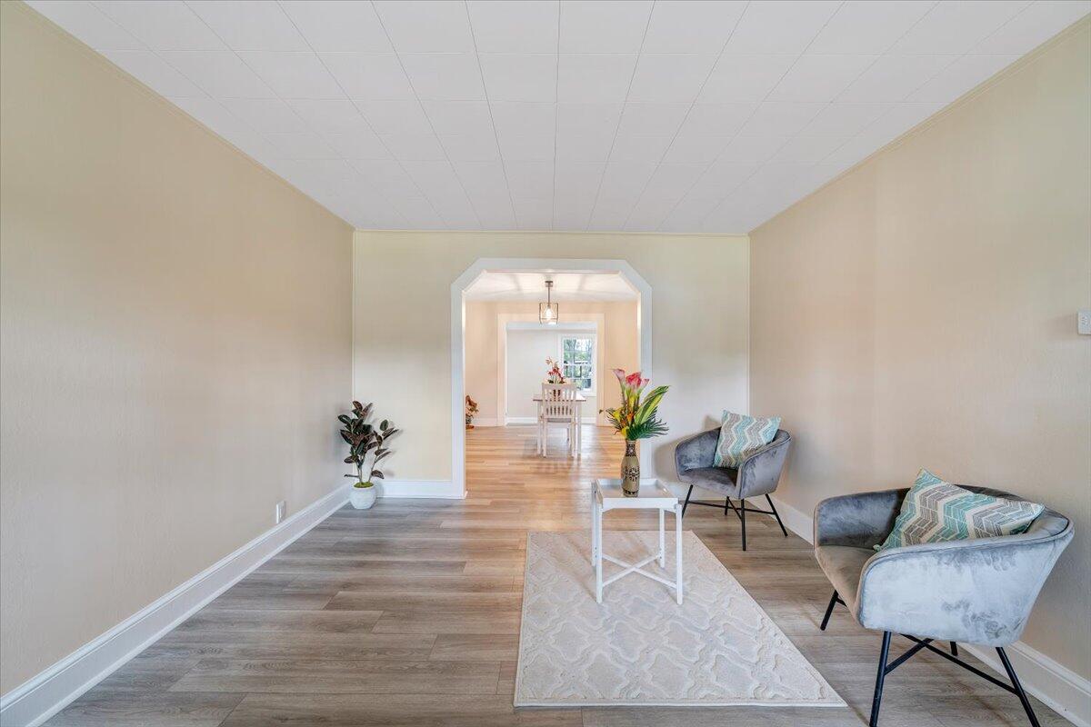 1433 Chalk Level Road Chatham, VA 24531 - Photo 21 of 41 a living room with furniture and a chandelier